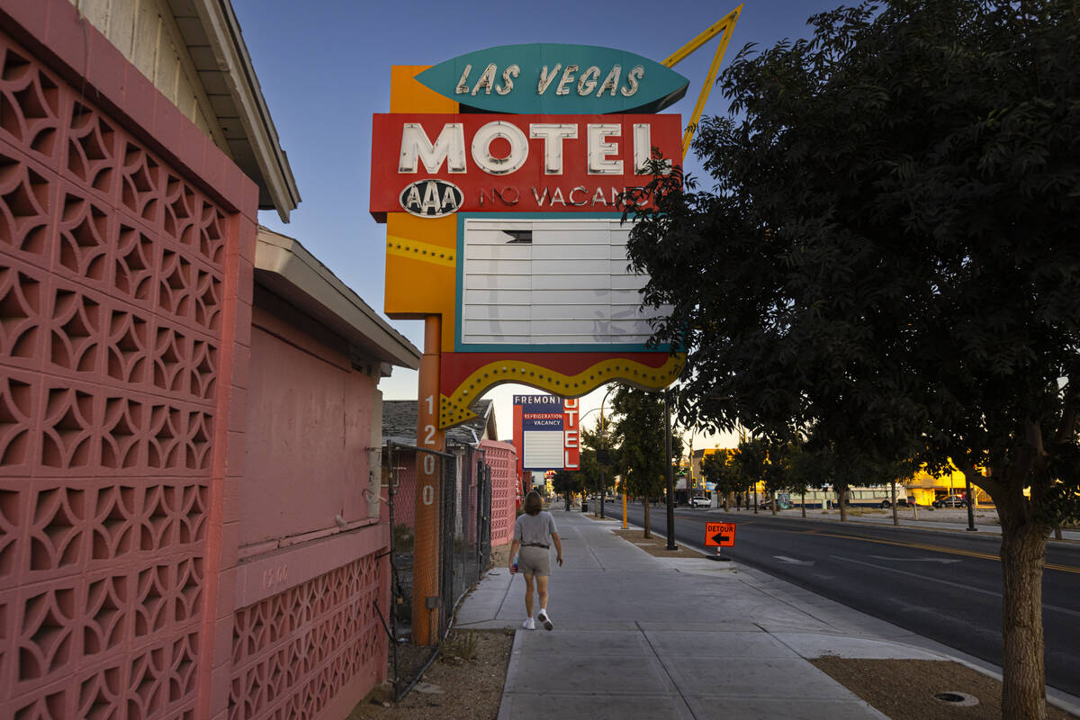 A person walks by the former Las Vegas Motel on Fremont Street by Maryland Parkway on Wednesday ...