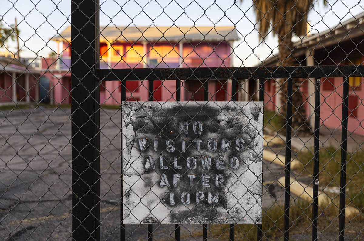 A sign outside the former Las Vegas Motel is seen on Fremont Street by Maryland Parkway on Wedn ...
