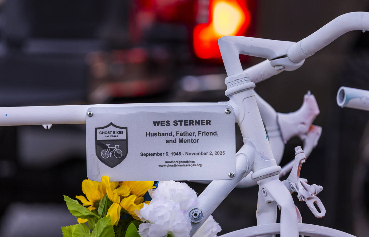 A name plate for Wesley Ervin Sterner is attached a bike placed by Ghost Bikes Las Vegas during ...