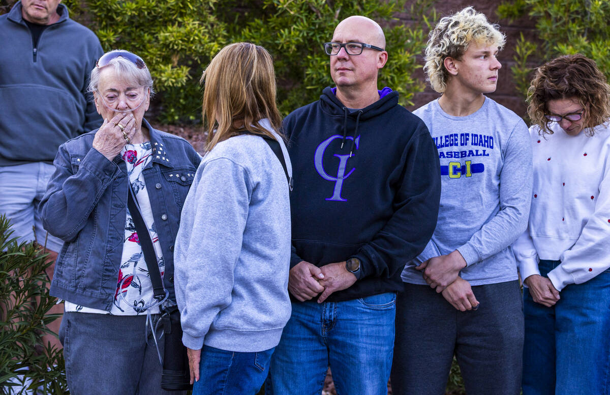 Wife Linda Sterner is overcome with emotion comforted by Crystal Probst as family members Shane ...