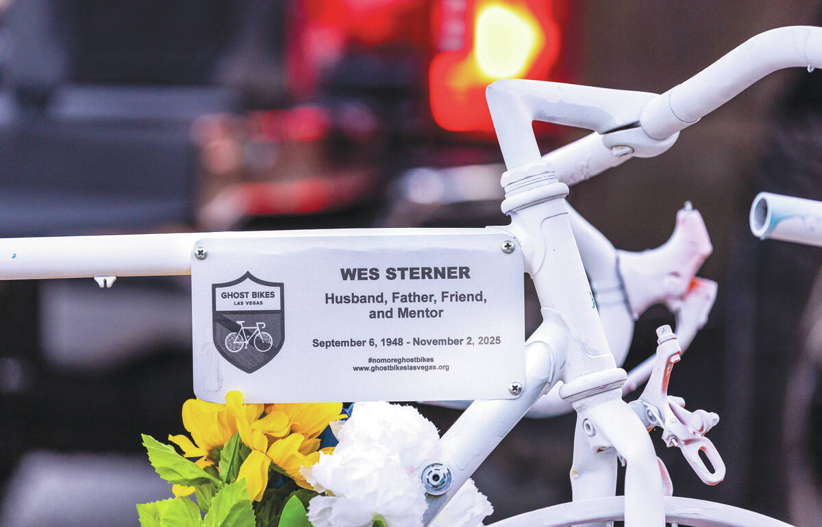 A name plate for Wesley Ervin Sterner is attached a bike placed by Ghost Bikes Las Vegas during ...