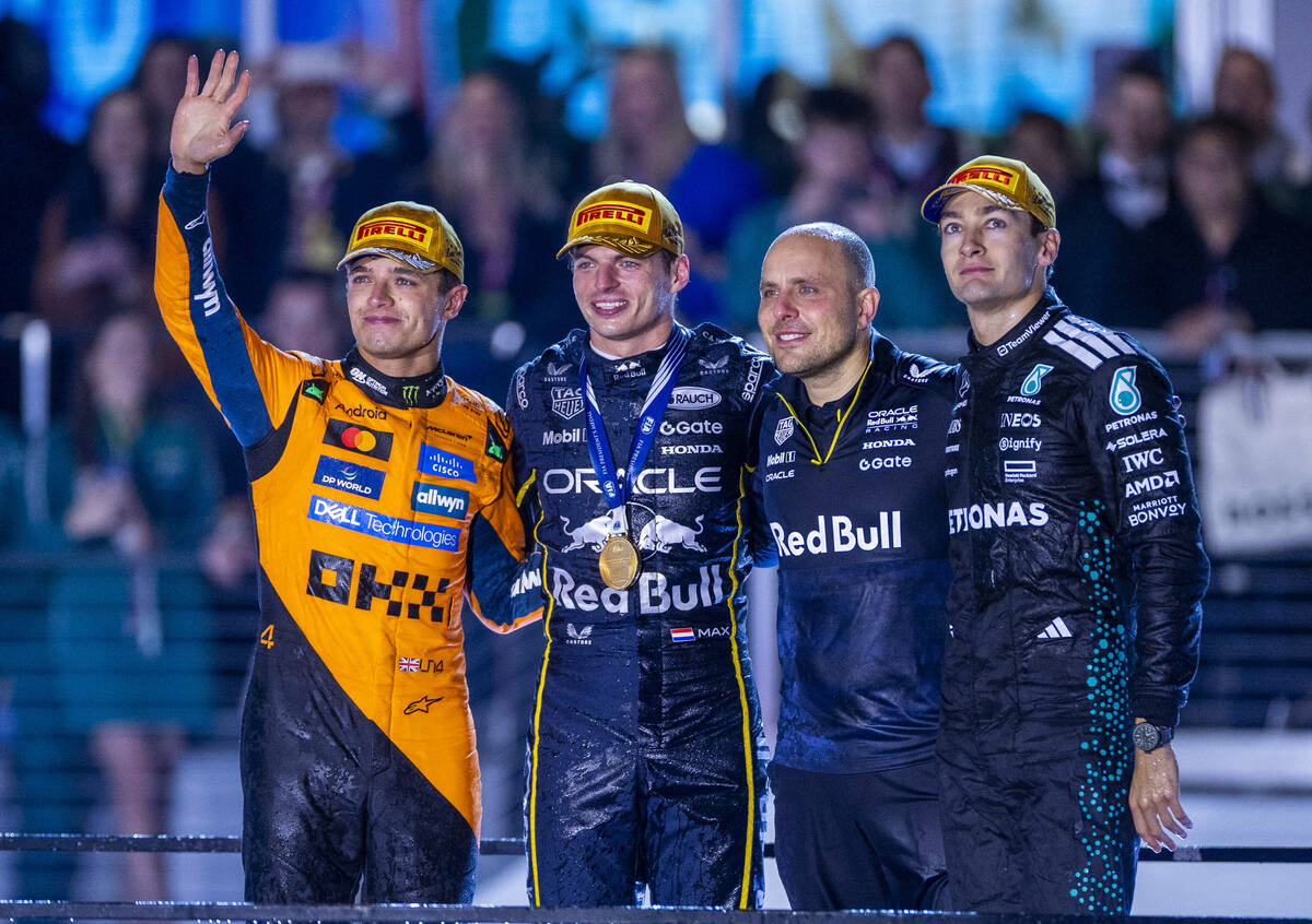 (LtoR) Second place McLaren driver Lando Norris (4), race winner Red Bull driver Max Verstappen ...