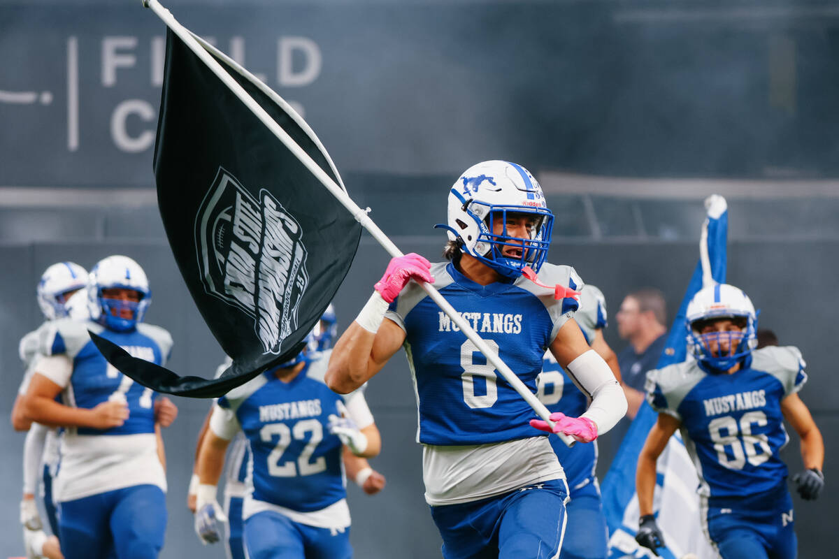 Needles’ Gabriel Rodriguez (8) enters the stadium for the 2A state championship game on ...