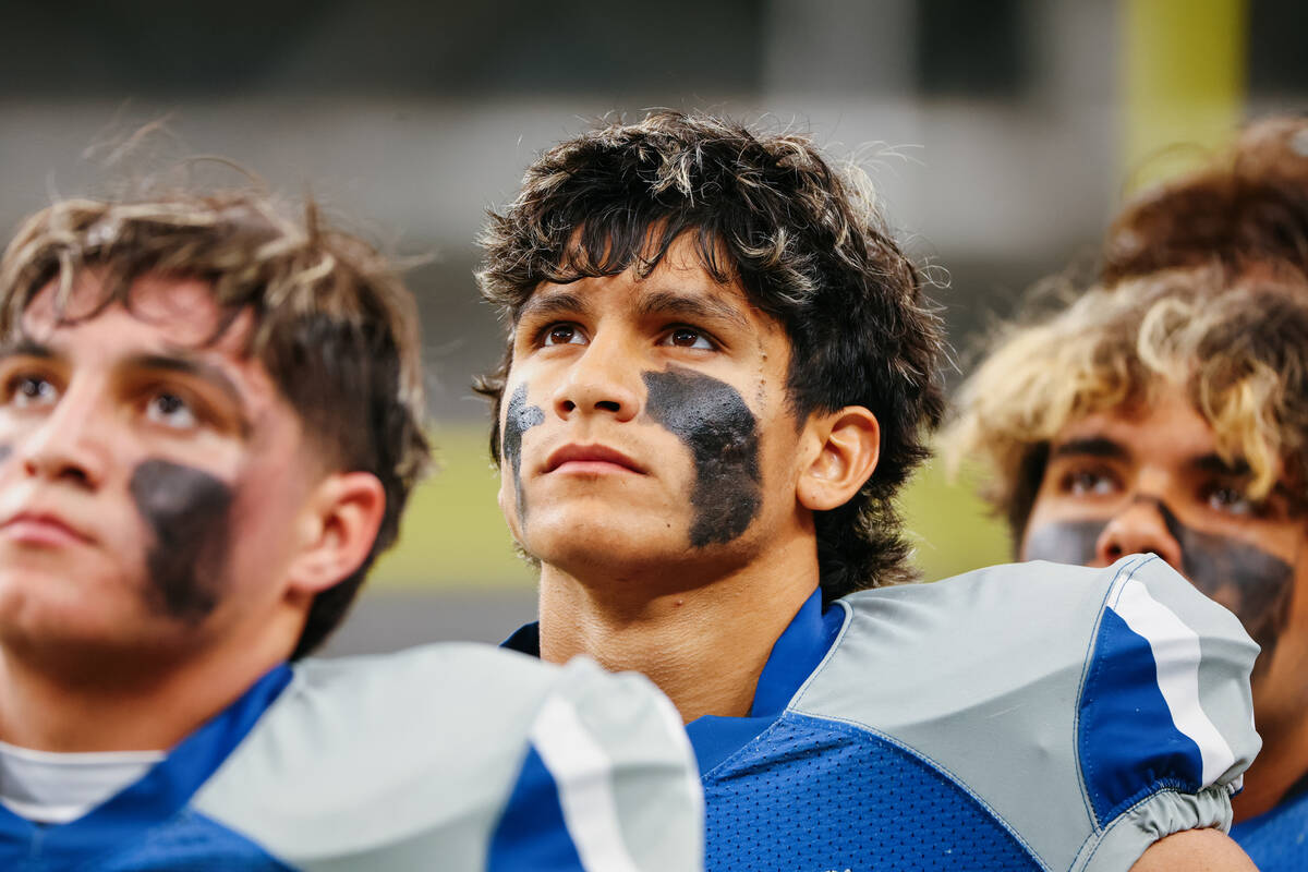 Needles’ Gabriel Rodriguez (8) stands for the national anthem before the 2A state champi ...