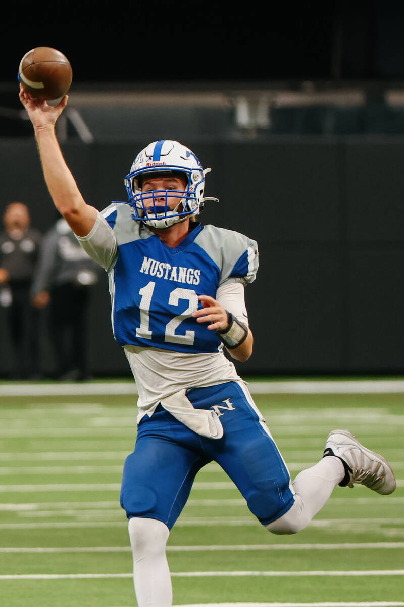 Needles quarterback Hudson Smith (12) passes the ball during the first half of the 2A state cha ...