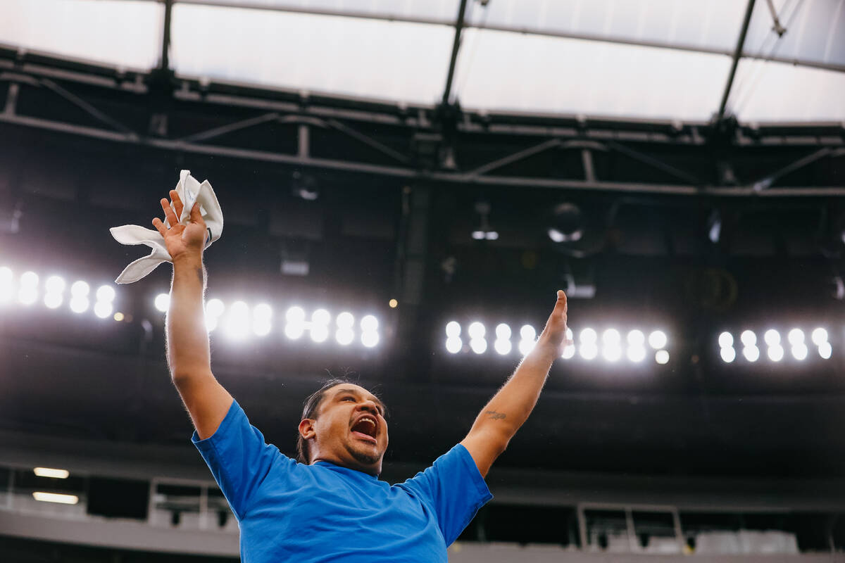 A Needles fan cheers toward the end of the 2A state championship game on Tuesday, Nov. 25, 2025 ...
