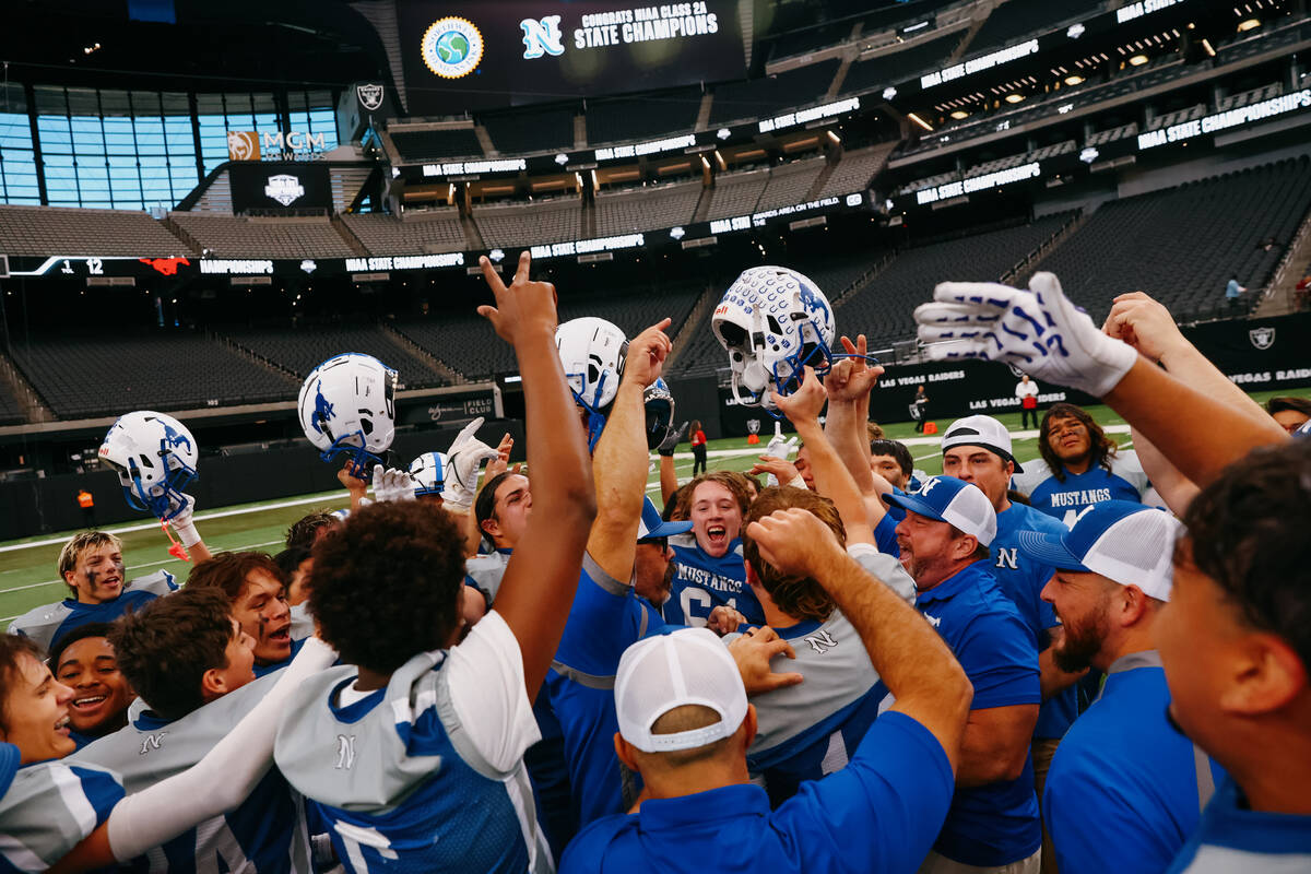 Needles players celebrate winning the 2A state championship game on Tuesday, Nov. 25, 2025 at A ...