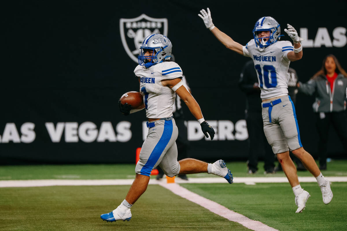 McQueen running back Nason Rodriguez (1) runs in for a touchdown during the second half of the ...