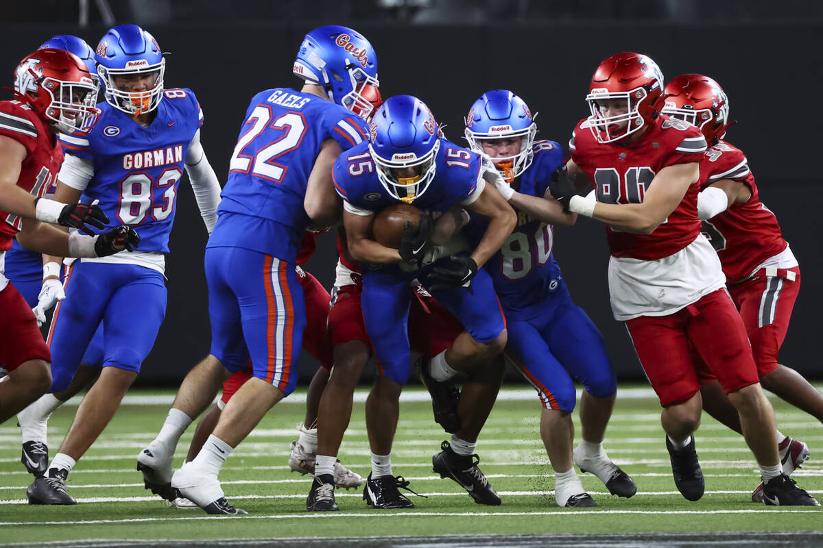 Bishop Gorman wide receiver Alijah Simmons (15) runs the ball against Arbor View during first h ...