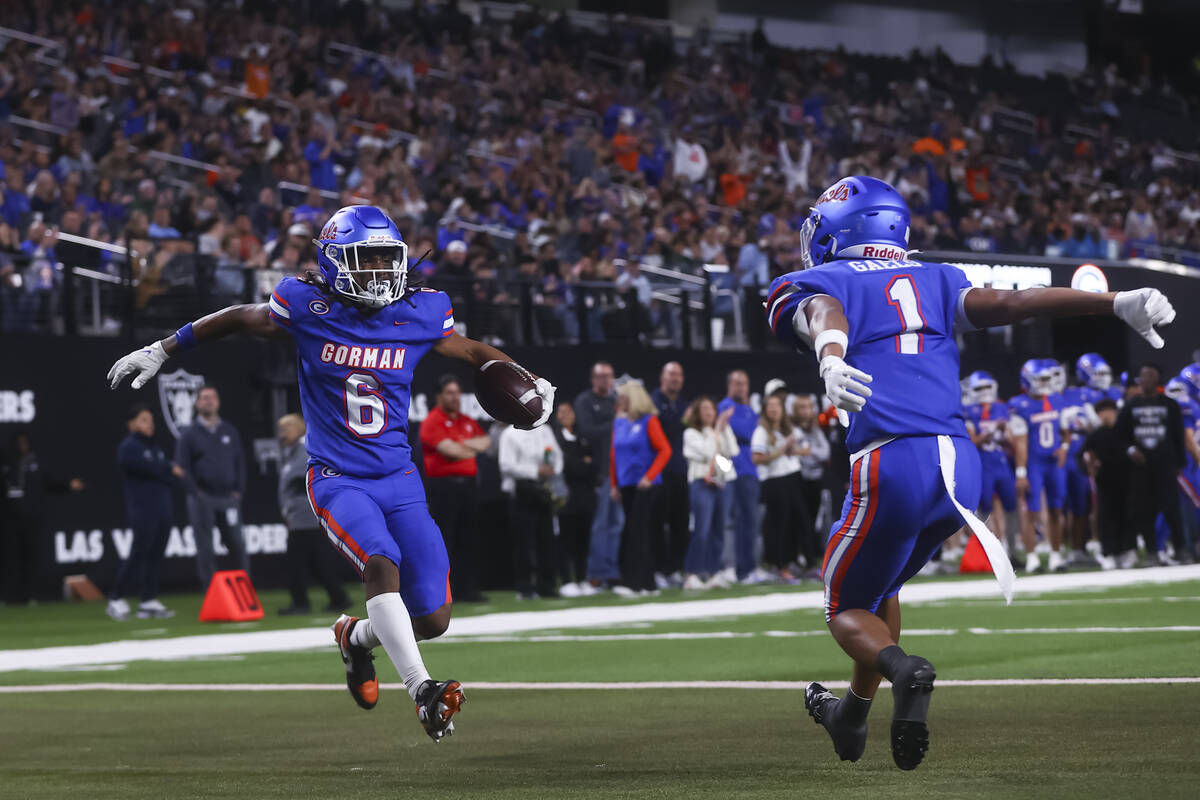 Bishop Gorman wide receiver Massiah Mingo (6) celebrates his touchdown with defensive back Isai ...
