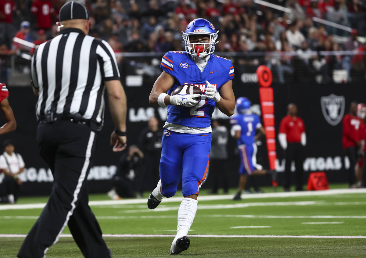 Bishop Gorman wide receiver Zyren Menor (2) scores a touchdown against Arbor View during first ...