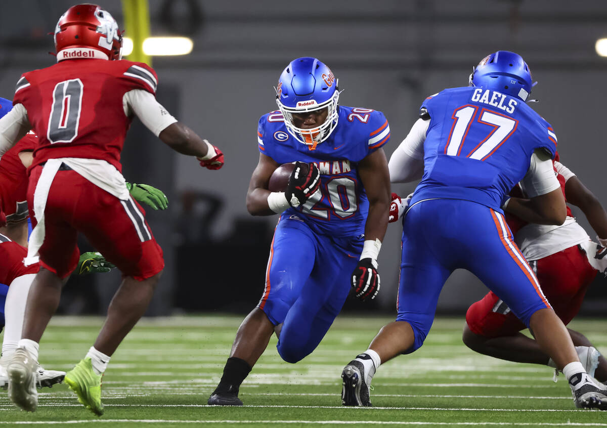 Bishop Gorman running back Noah Cole (20) runs the ball against Arbor View during first half of ...
