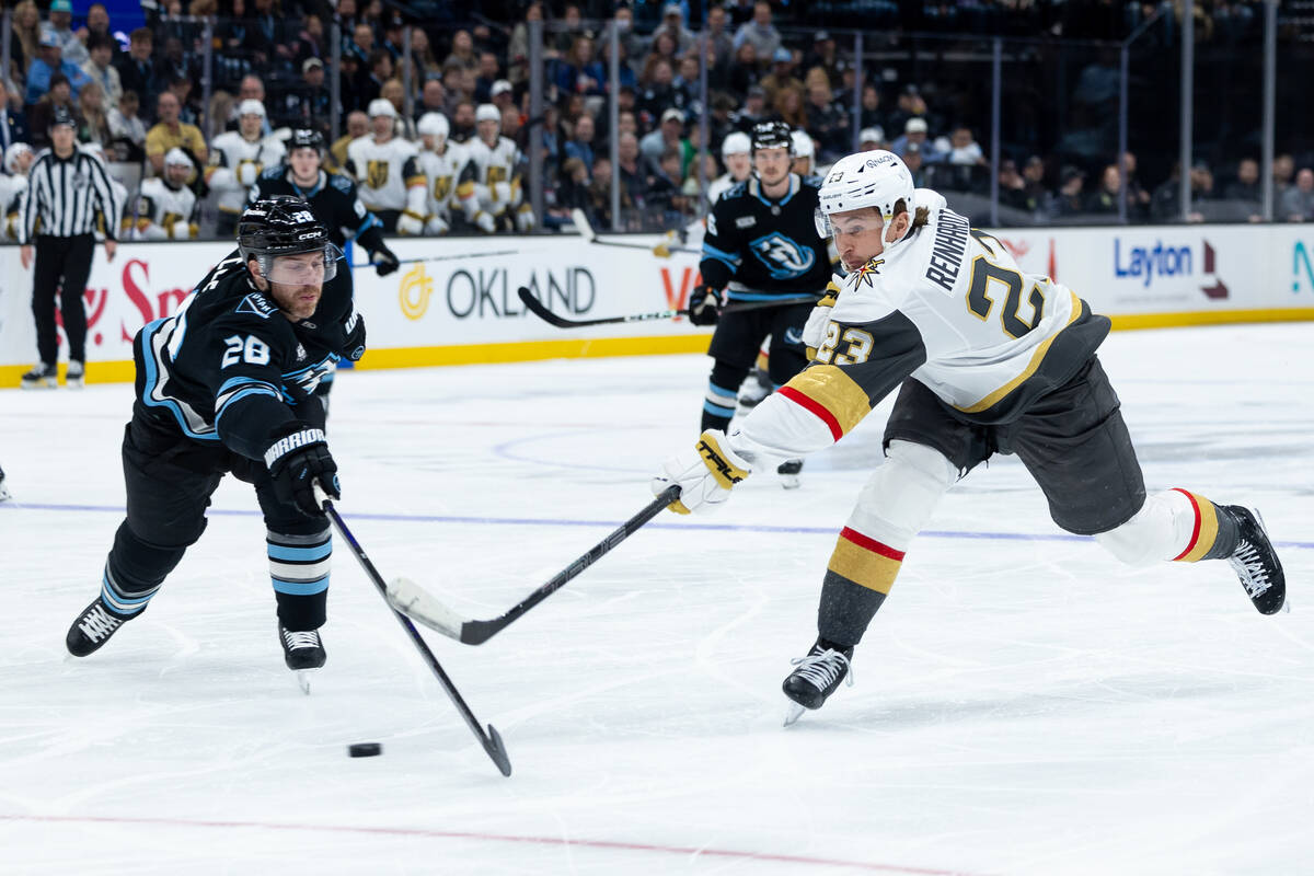 Utah Mammoth defenseman Ian Cole (28) defends against a shot by Vegas Golden Knights left wing ...