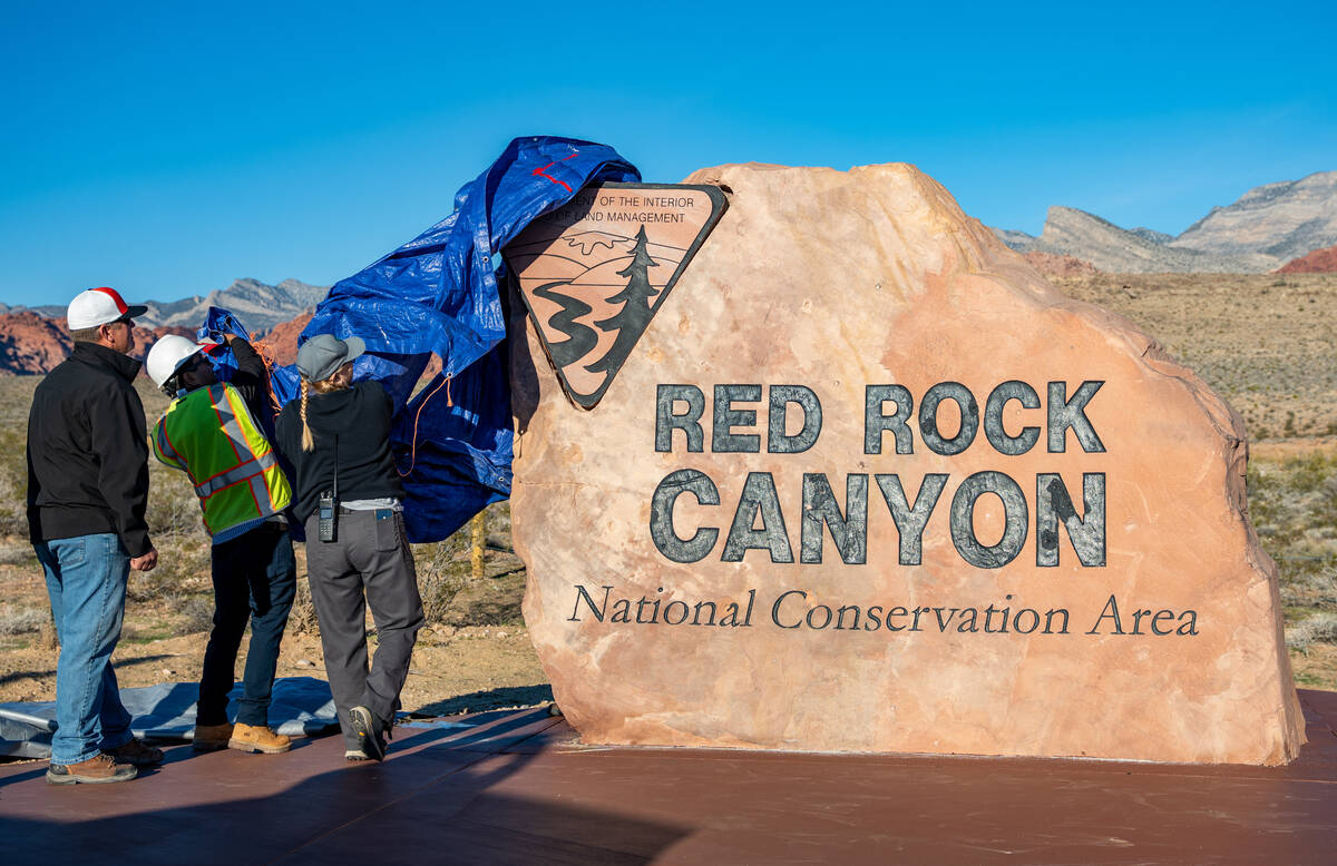 The relocated Red Rock Canyon sign is revealed during the opening of an accompanying parking lo ...
