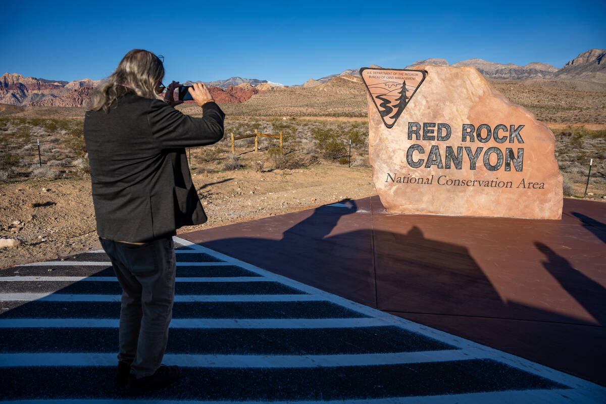 Matthew Dwyer of Long Island, N.Y., becomes the first visitor to photograph the relocated Red R ...
