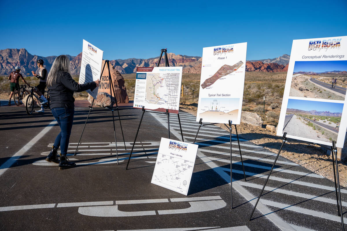 Maps and information are displayed as agency partners gather for the opening of the relocated R ...