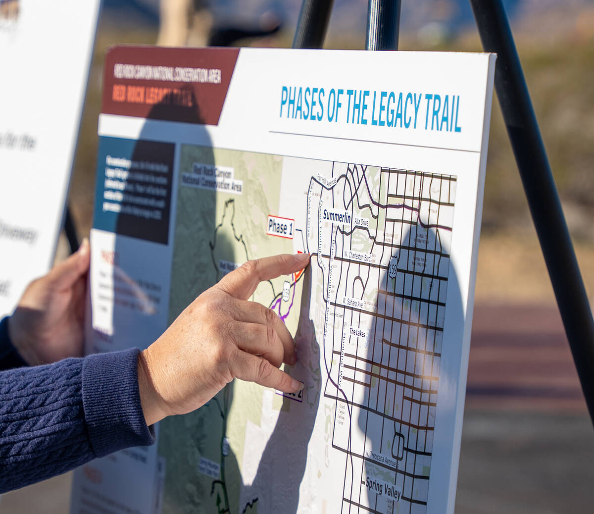 Maps and information are displayed as agency partners gather for the opening of the relocated R ...