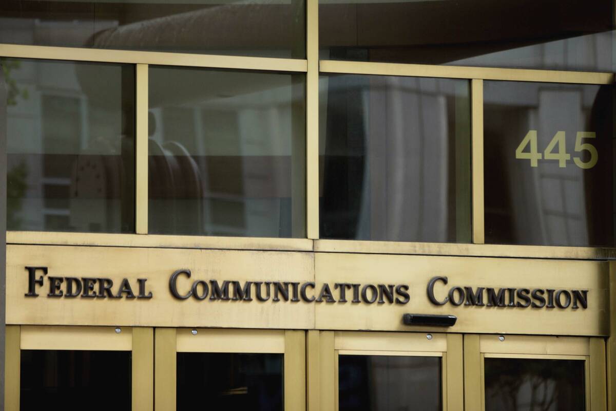 The entrance to the Federal Communications Commission building in Washington. (AP Photo/Andrew ...