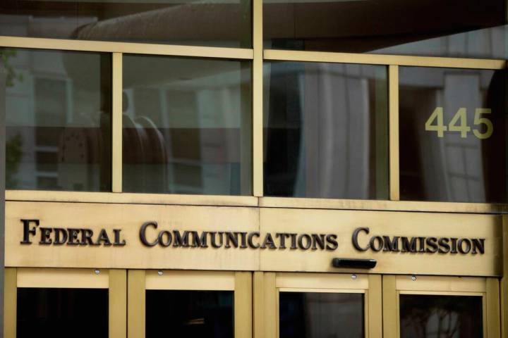 The entrance to the Federal Communications Commission building in Washington. (AP Photo/Andrew ...