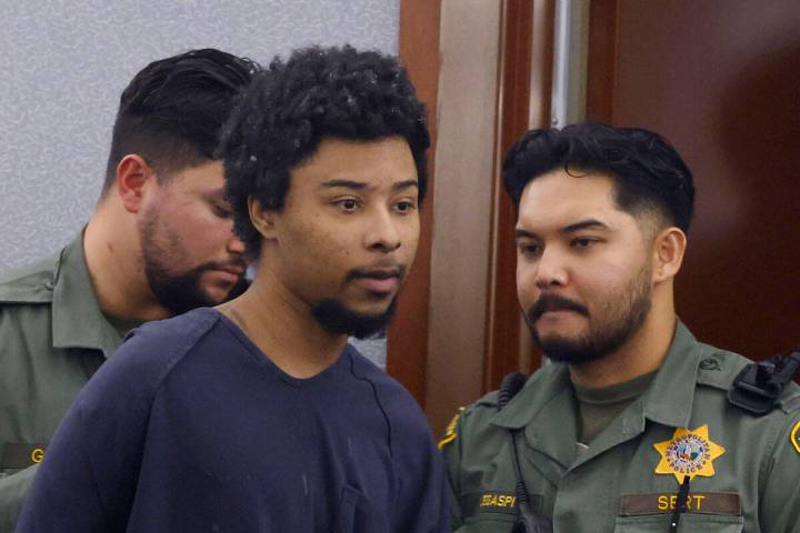 Stanley Weaver, who pleaded guilty to stalking Gov. Joe Lombardo and his family, is led out of ...