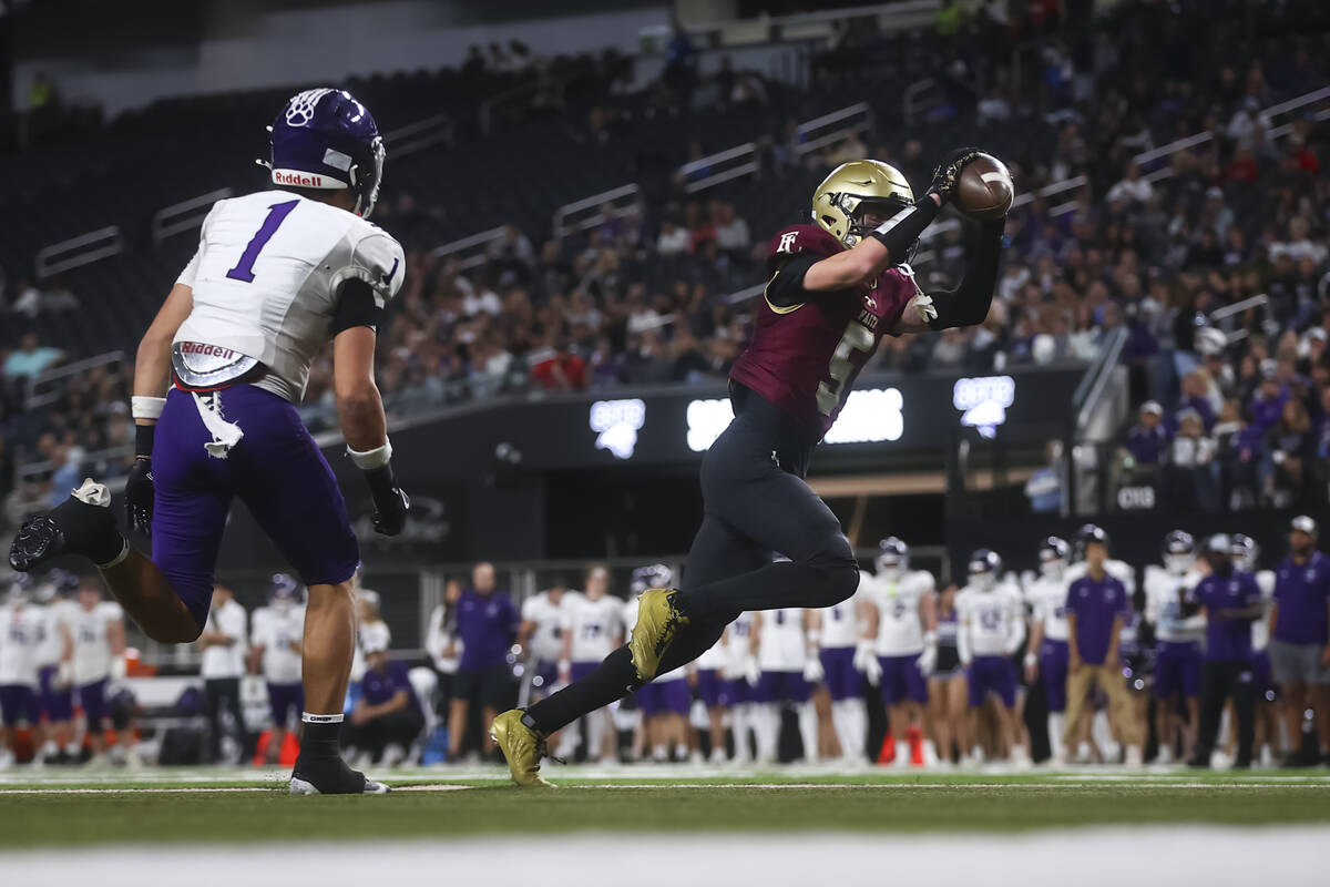 Faith Lutheran wide receiver Jaden Mason (5) scores a touchdown past Spanish Springs’ Br ...