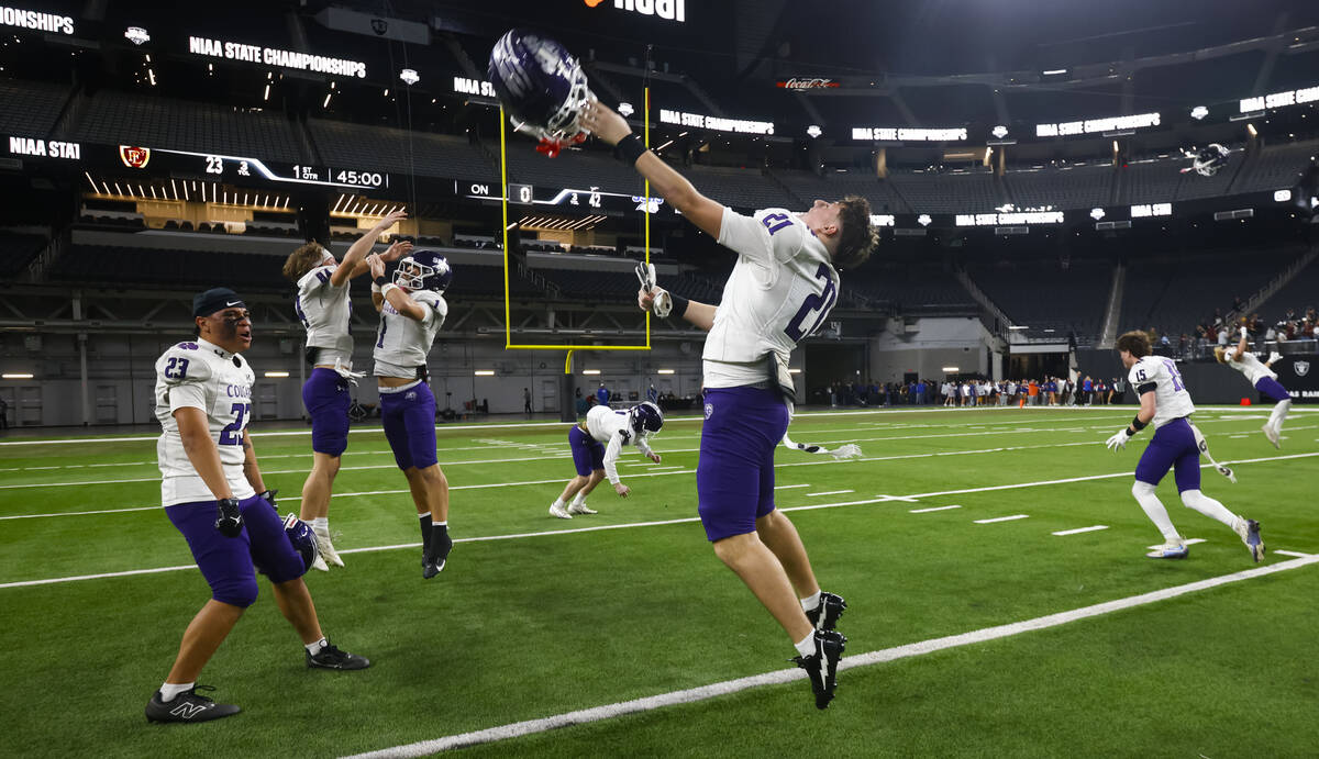 Spanish Springs players celebrate after defeating Faith Lutheran to win the Class 5A NIAA state ...