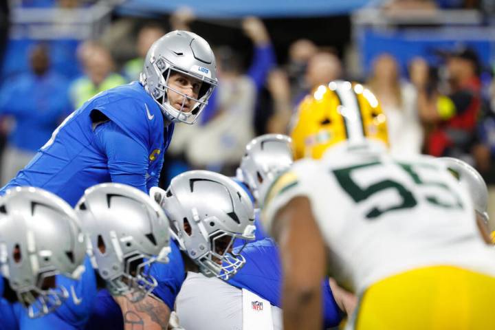 Detroit Lions quarterback Jared Goff (16) gets set to run a play against the Green Bay Packers ...