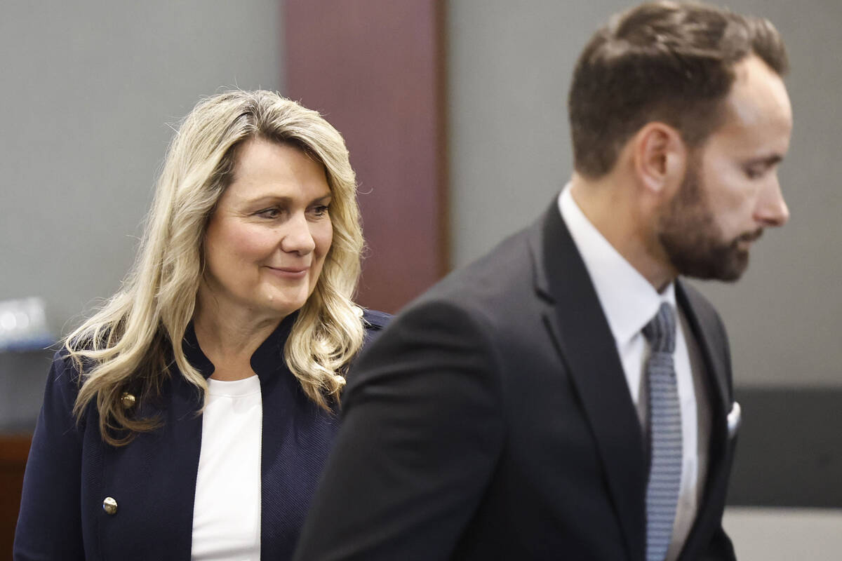Henderson Councilwoman Carrie Cox, left, appears with defense attorney Josh Tomsheck at her arr ...