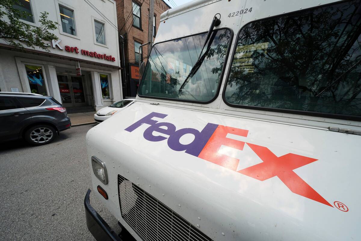 A FedEx truck makes deliveries in Pittsburgh on Wednesday, June 25, 2025. (AP Photo/Gene J. Pus ...