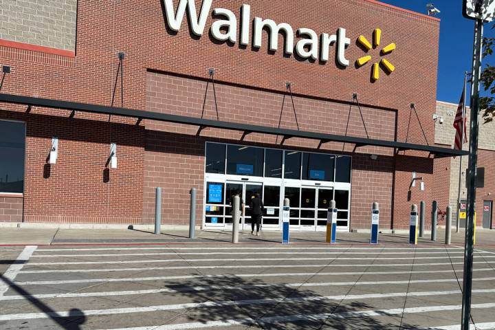 A shopper heads into a Walmart store Thursday, Oct. 16, 2025, in Englewood, Colo. (AP Photo/Dav ...