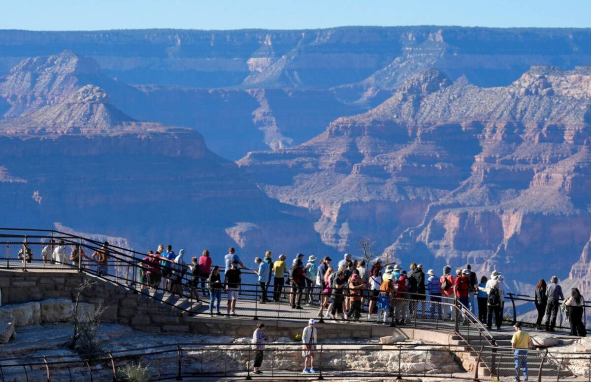 Tourists flock to Mather Point at Grand Canyon National Park, Oct. 1, 2025, in Grand Canyon, Ar ...