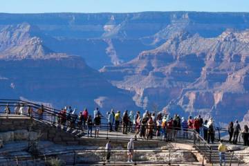 Tourists flock to Mather Point at Grand Canyon National Park, Oct. 1, 2025, in Grand Canyon, Ar ...