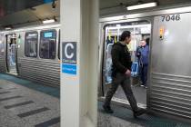 A Chicago police officer patrols the Clark Street and Lake Street Blue Line stop where a man do ...
