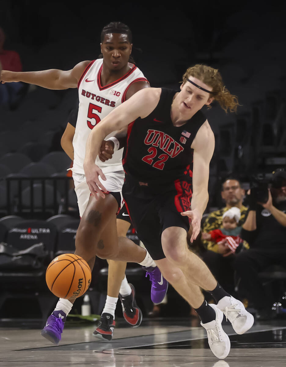 Rutgers guard Darren Buchanan Jr. (5) tries to get the ball from UNLV forward Walter Brown (22) ...