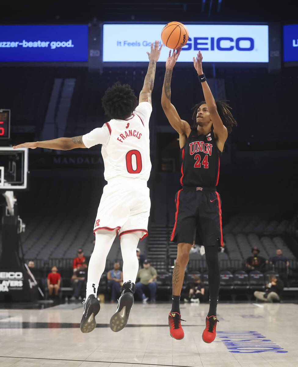 UNLV forward Naas Cunningham (24) shoots over Rutgers guard Tariq Francis (0) during the second ...