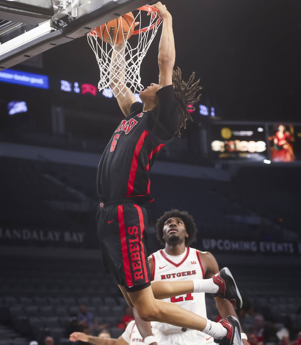 UNLV forward Tyrin Jones (6) dunks against Rutgers during the second half of a game in the Play ...