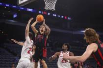 UNLV guard Dravyn Gibbs-Lawhorn (0) shoots against Rutgers during the first half of a game in t ...