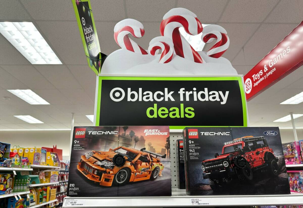 Sign marks special prices on toys as retailers roll out Black Friday deals, Wednesday, Nov. 26, ...