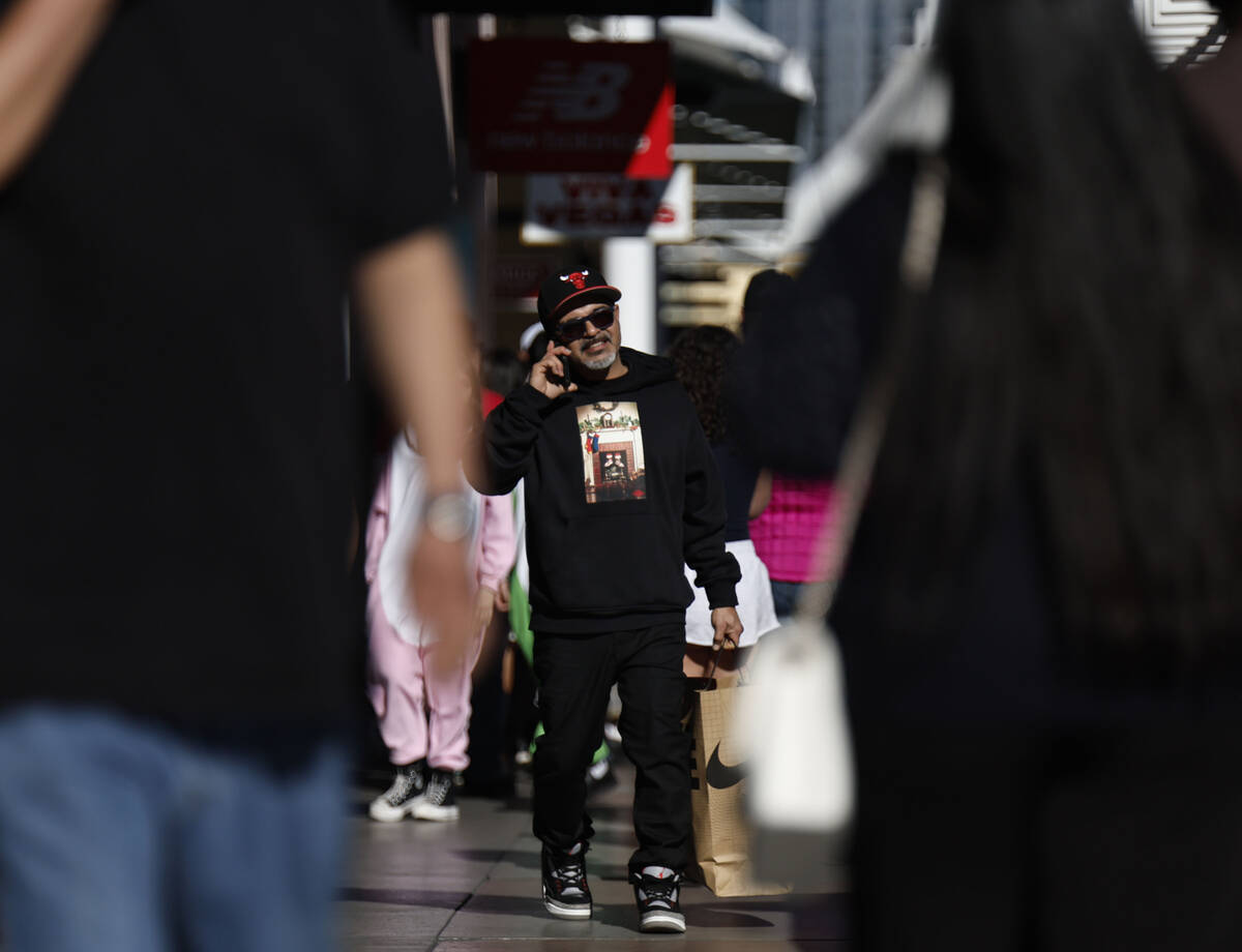 People shop during Black Friday at Las Vegas North Premium Outlets Friday, Nov. 28, 2025 in Las ...