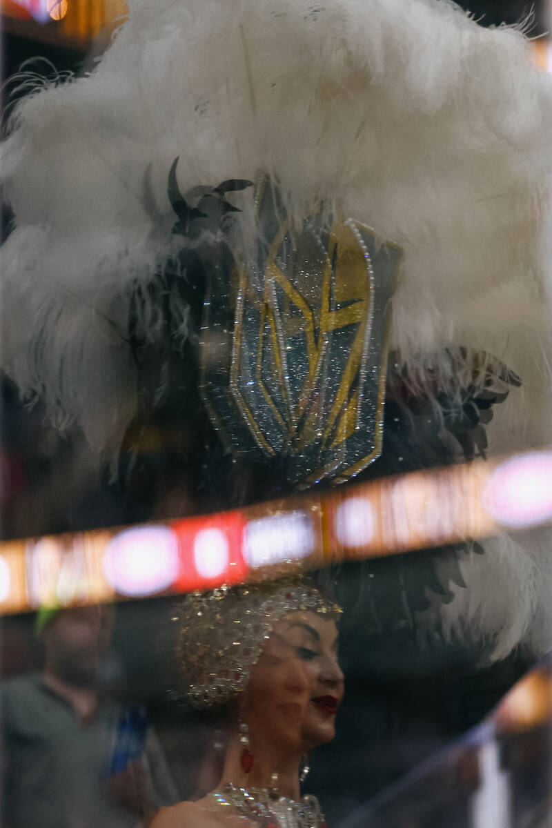 A Golden Knights showgirl dances during warmups before the game on Friday, Nov. 28, 2025 at T-M ...