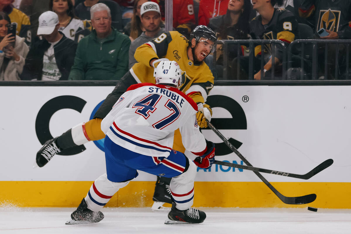 Golden Knights right wing Reilly Smith (19) passes the puck around Montréal Canadiens defe ...