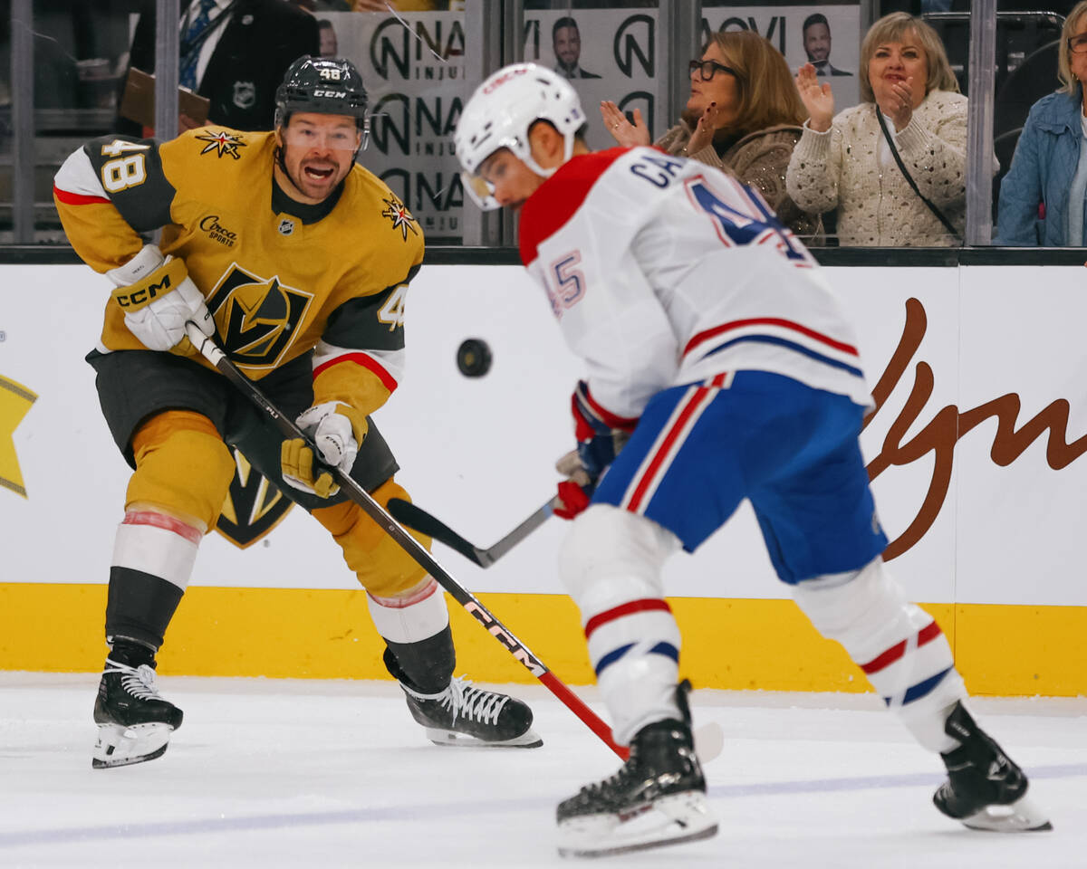 Golden Knights center Tomas Hertl (48) and Montréal Canadiens defenseman Alexandre Carrier ...