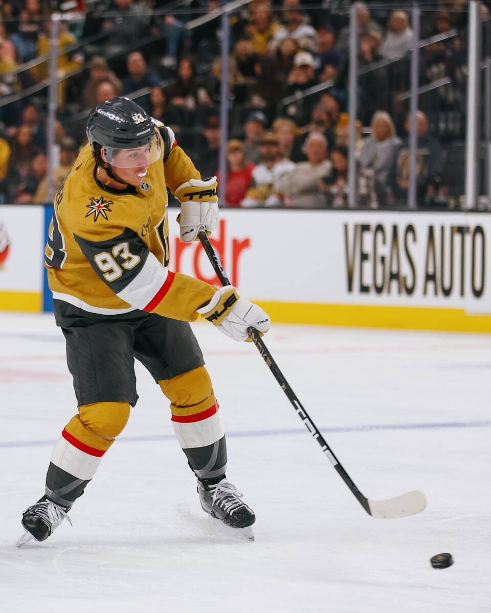 Golden Knights right wing Mitch Marner (93) takes a shot on goal during the first period of the ...