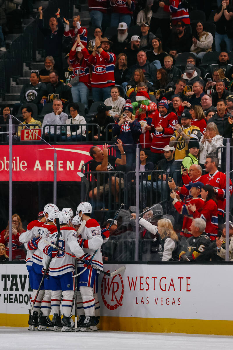 Montréal Canadiens fans cheer as players celebrate their first goal against the Golden Kni ...