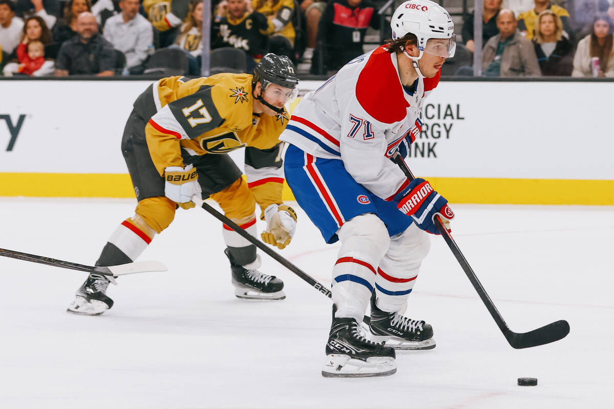 Montréal Canadiens center Jake Evans (71) skates toward the goal, looking to make a shot a ...
