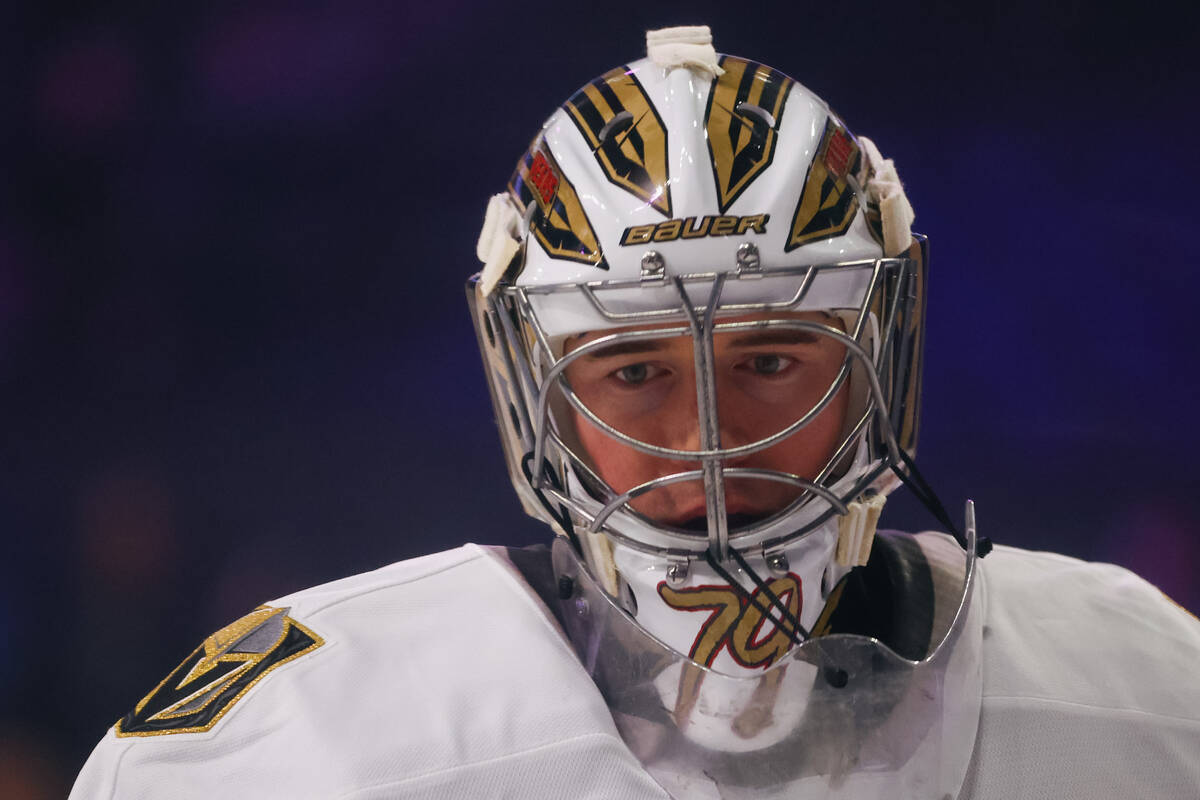Goaltender Carter Hart warms up before the Silver Knights’ game against the Calgary Wranglers ...