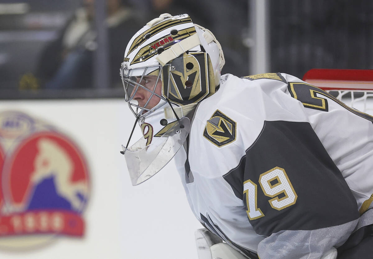 Silver Knights goaltender Carter Hart (79) looks on during the second period of an AHL hockey g ...