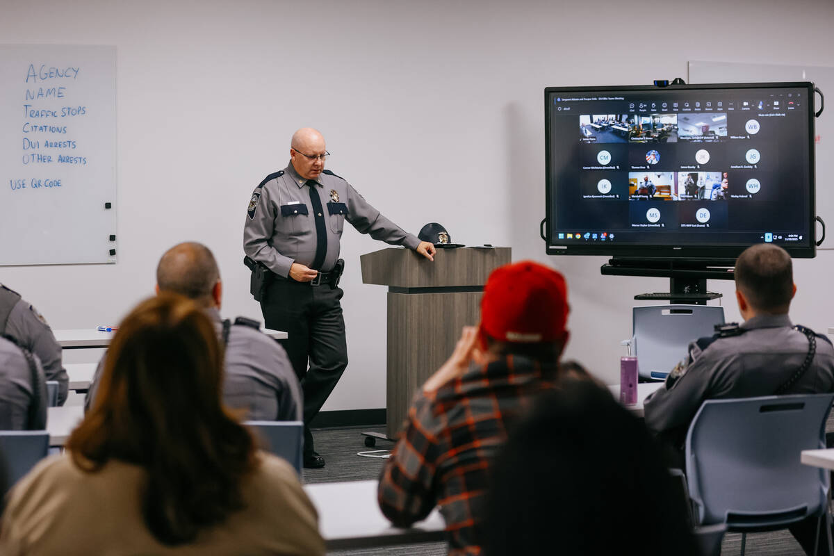 Major Kevin Honea, Deputy Chief of the Nevada Highway Patrol, speaks to officers from various l ...