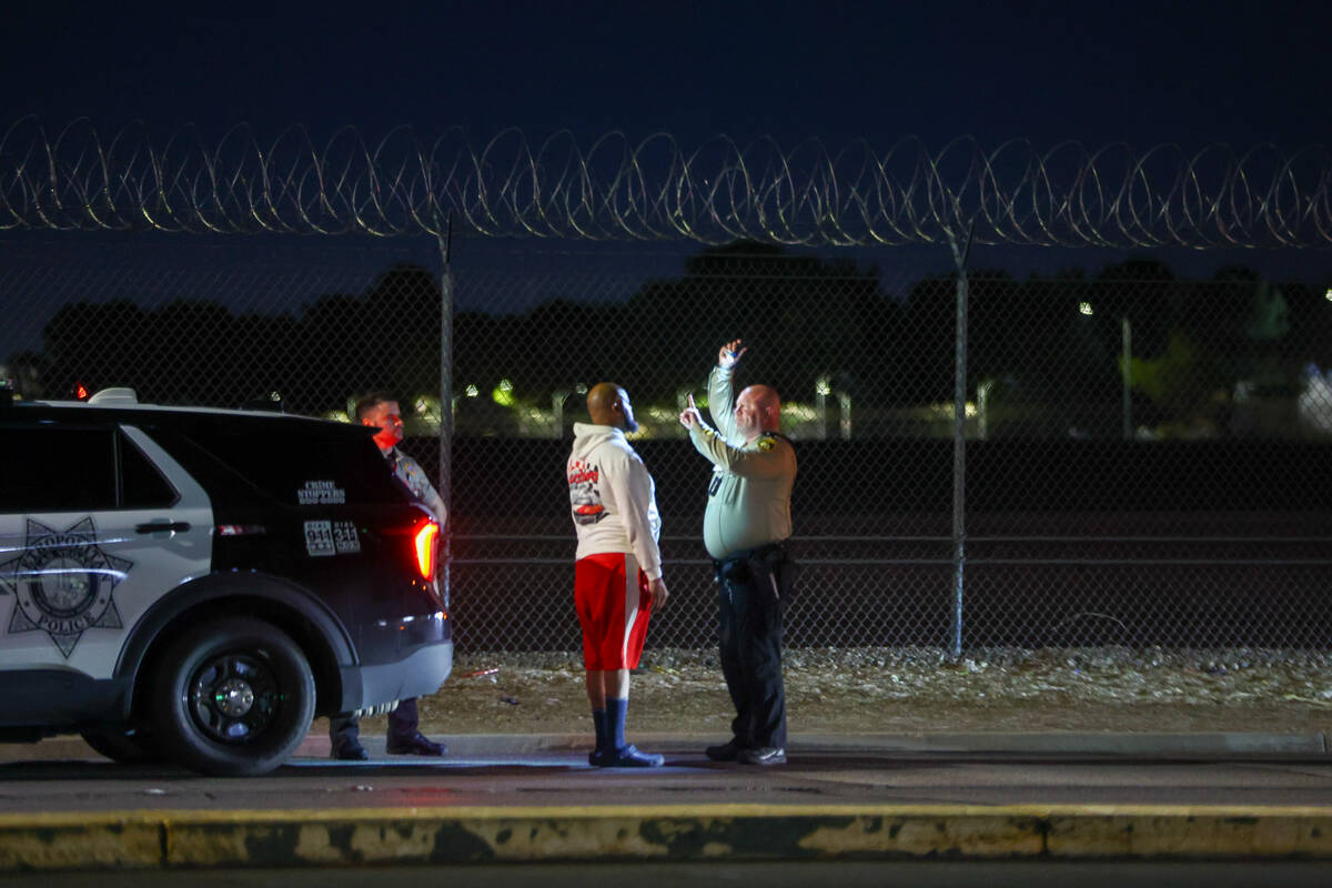 Metropolitan Police officers make a traffic stop along Sunset Road after a DUI blitz was held a ...