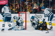 Golden Knights left wing Ivan Barbashev (49) falls after an attempt to score during an NHL hock ...
